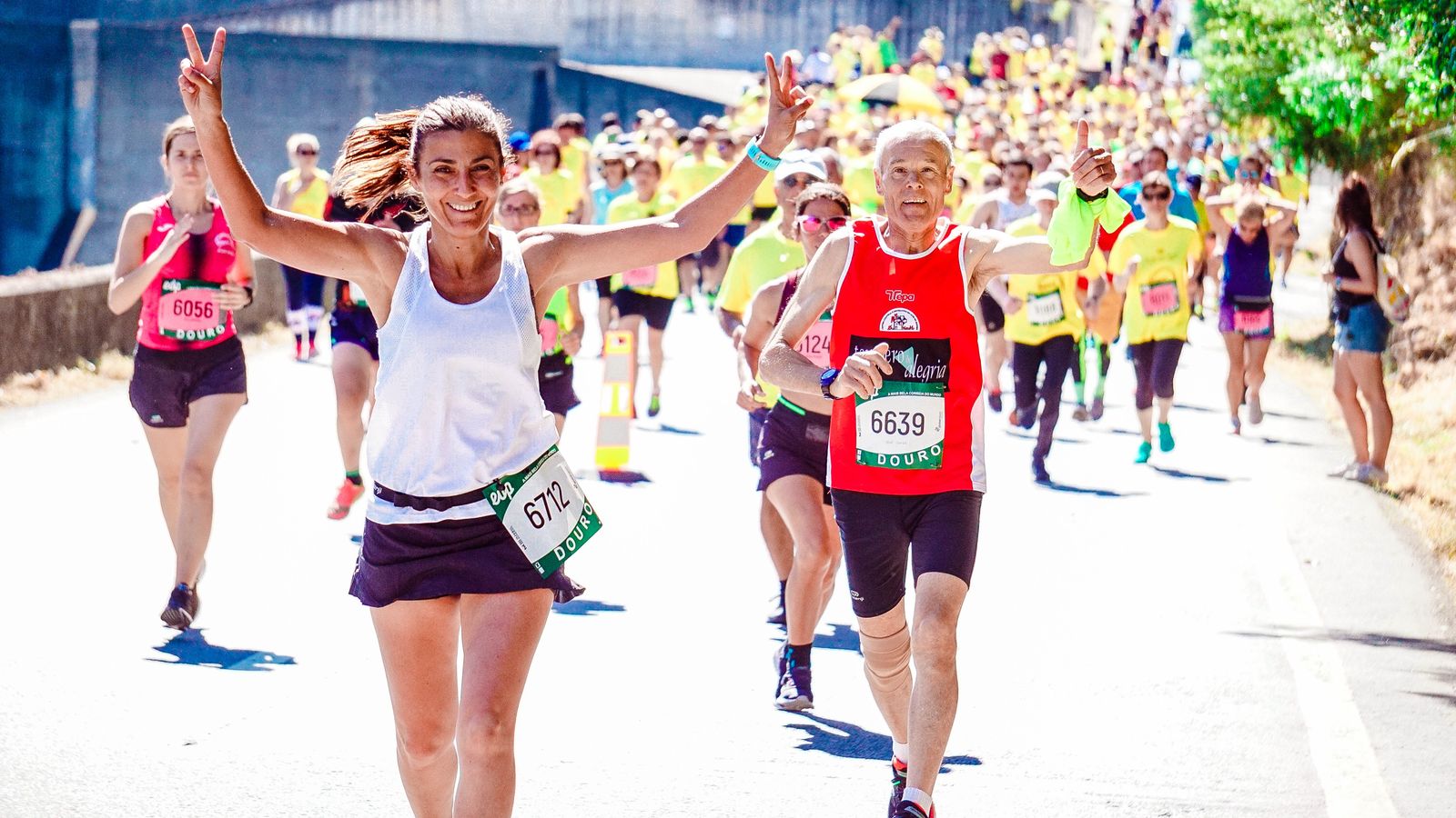Cheering runners at an outdoor marathon